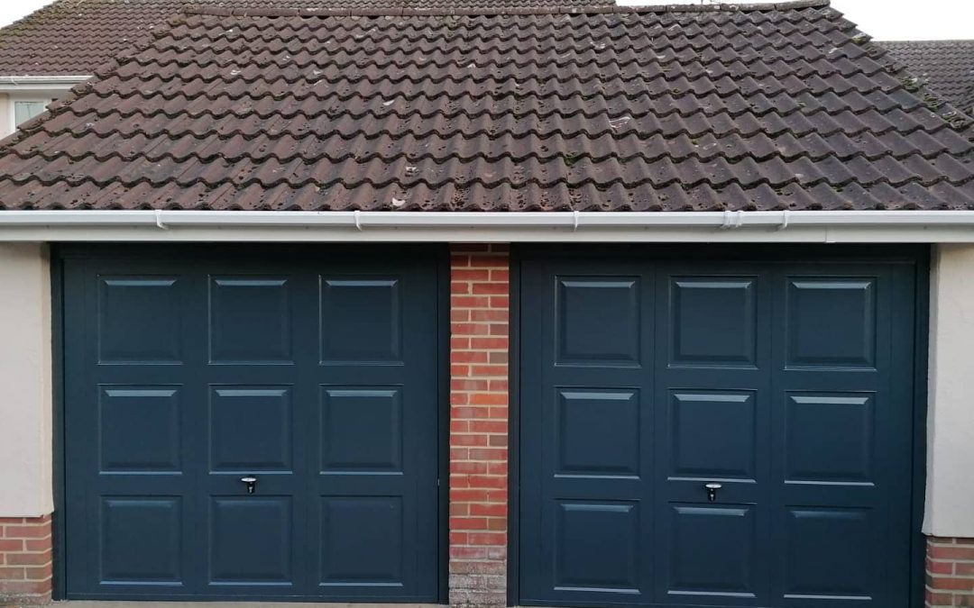 X2 Georgian retractable steel framed garage doors