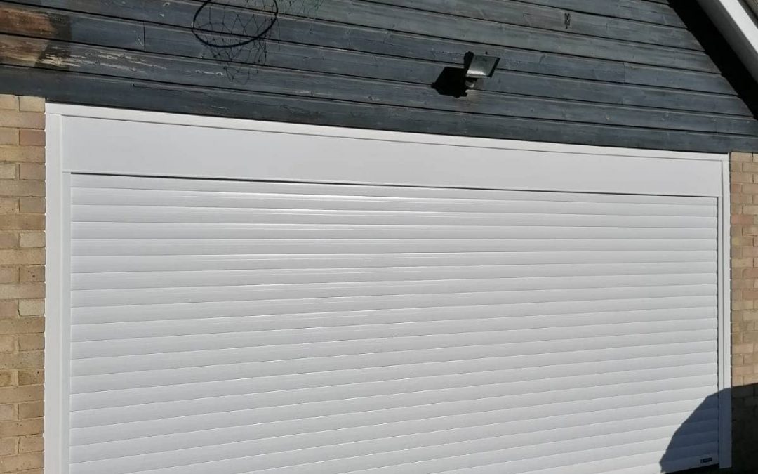 Bright is white! New roller shutter garage doors