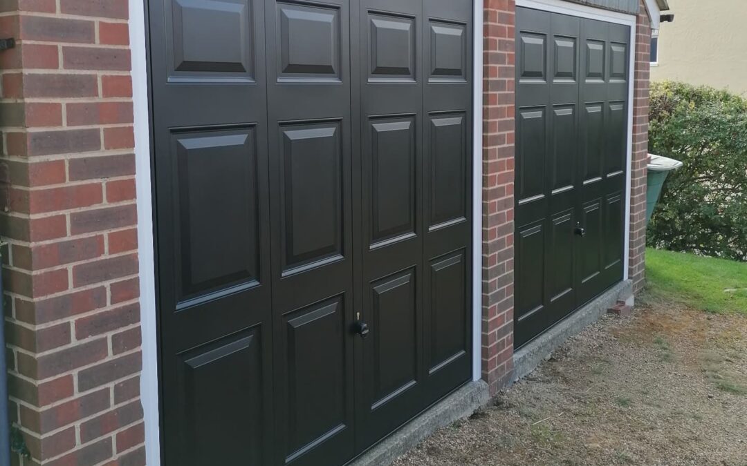 X2 Georgian retractable steel framed garage doors