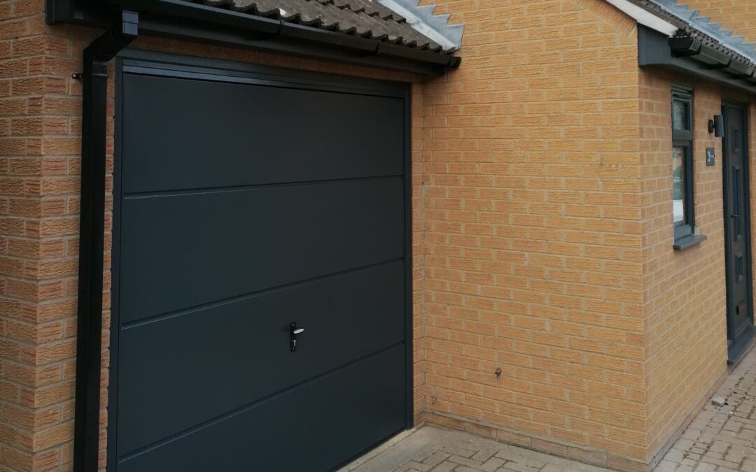 Anthracite grey garage door.