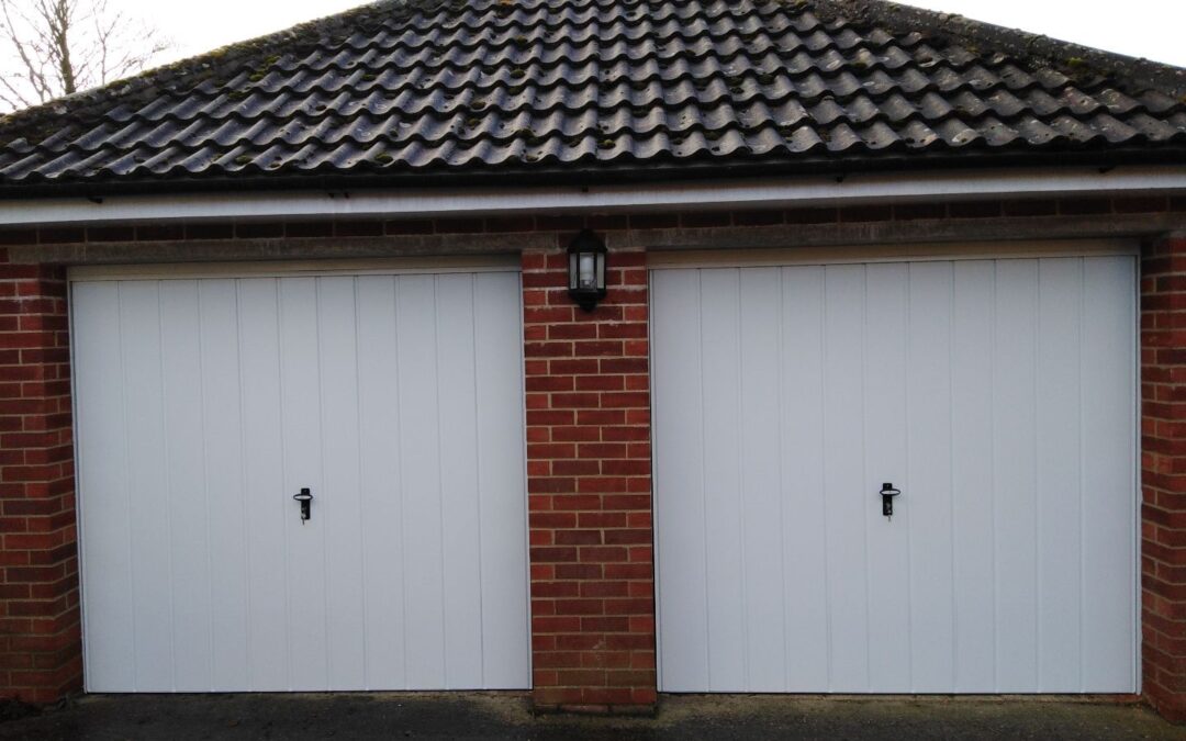 New up and over canopy steel framed garage doors…